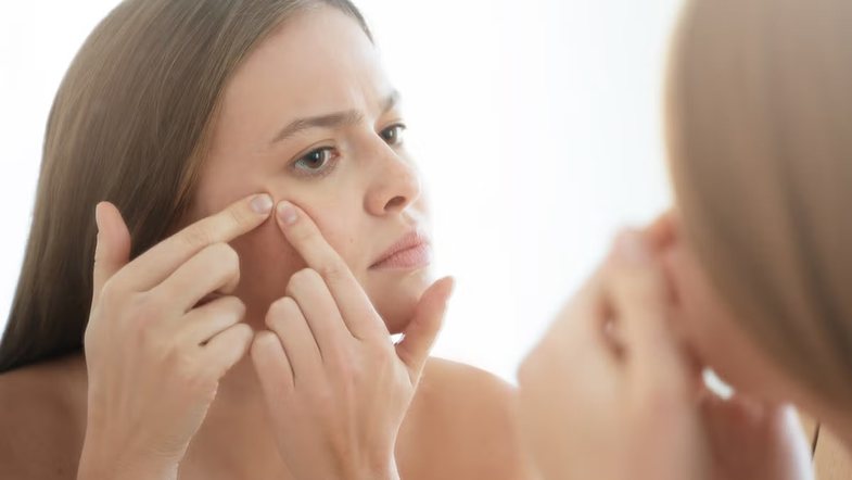 What do pimples in certain areas of the face mean?